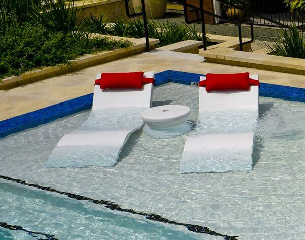 Ledge Lounger Signature In-Pool Chaise Lounge Made Of Plastic Resin