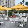 Picture of Tropitone South Beach Relaxed Sling Dining Chair, Stackable, 10.5 lbs.