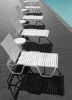 Picture of Telescope Reliance Contract Armless Vinyl Strap Chaise Lounges with Aluminum Frame