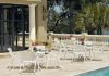 Picture of Telescope Round Dining Table 48 Inch Werzalit Table with Aluminum Frame