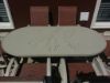 Picture of 42” x 76” Sierra Oval Punched Aluminum Patio Dining Table with Aluminum Frame