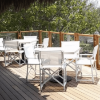 Boss Folding Sling Dining Chair with Polypropylene Frame -Lifestyle