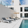 Sky Club Stackable Polypropylene Sling Chaise Lounge - Lifestyle