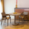 Barcino Round Pedestal Dining Table with Anodized Aluminum Frame, 23.6” or 31.5” - Lifestyle