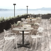 Toledo Air XL Round Dining Patio Table with HPL Top and Painted Aluminum X Base, 35.4” or 39.4” -  Lifestyle