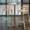 Toledo 27.6” High Round Bar Height with HPL Top and Painted Aluminum X Base - Lifestyle