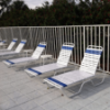 Coast Vinyl Strap Pool Lounge Chair - 12” Low Profile Seat Height - Lifestyle