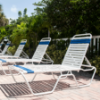 Coast Vinyl Strap Pool Lounge Chair  - 16” Elevated Seat Height - Lifestyle