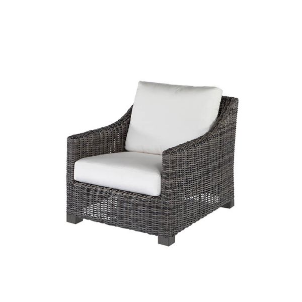 Woven wicker club chair with white cushions in smoke finish.