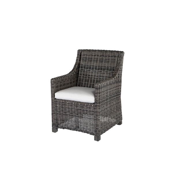 Dark wicker dining arm chair with white cushion in smoke finish.