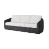 Boulevard wicker sofa with white cushions in coal finish.