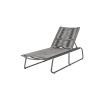 Outdoor woven chaise lounge in fog gray with graphite frame for poolside relaxation