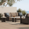 Outdoor patio with Corte woven padded sofa in Cocoa and Hazel finish paired with modern coffee table