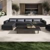 Grande wicker padded 105-inch armless sofa sectional with chaise lounge and coffee table in modern outdoor setting.