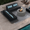 Grande wicker armless loveseat sectional in Coal Smoke with fire pit and aqua accent pillows.