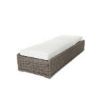Laurent wicker chaise lounge in Driftwood finish with white cushion, shown in fully reclined position.