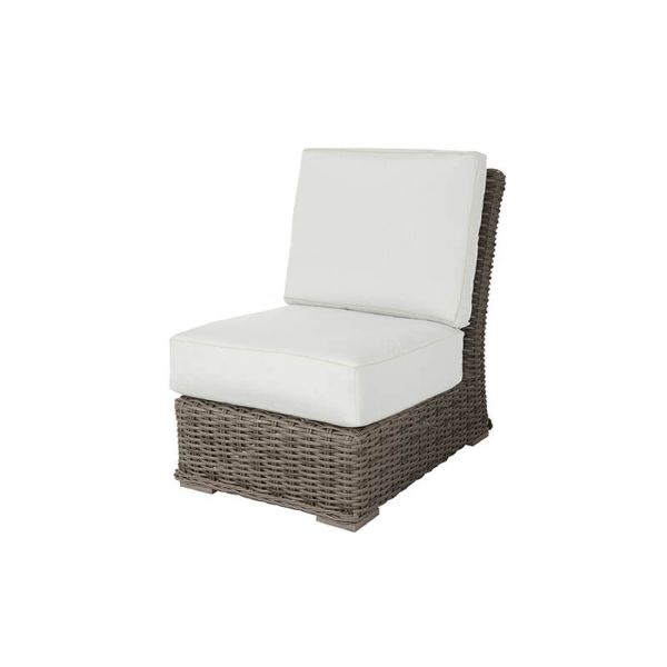 Laurent wicker cushion armless sectional chair in Driftwood finish with white cushions.