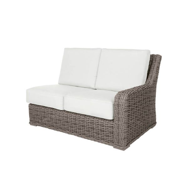 Laurent wicker cushion left sectional loveseat in Driftwood finish with white cushions for outdoor seating.