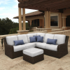 Outdoor Laurent wicker sectional with right-arm loveseat and ottoman on a luxury patio