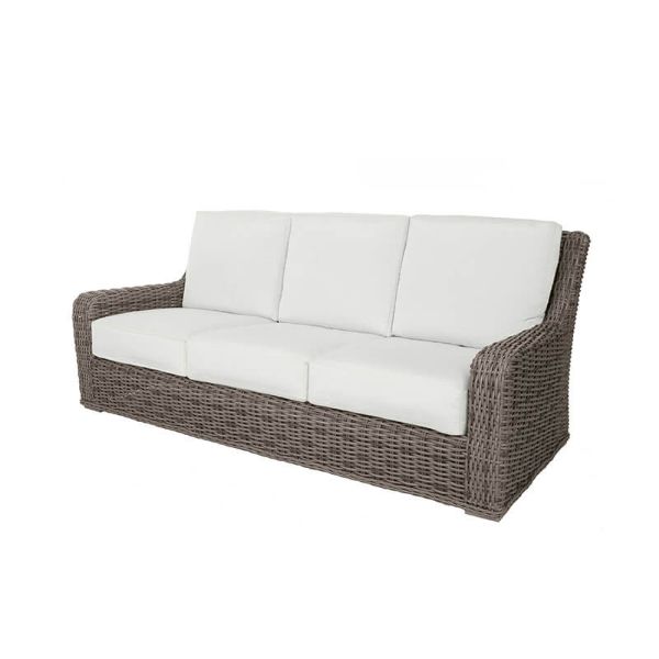 Laurent wicker cushion sofa with driftwood frame and plush seating, styled for outdoor patios and resort lounges.