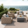 Mia Woven Cushion Club Chairs in Barley Finish Arranged on Resort Patio Overlooking the Ocean