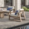 Modern Novara Cushion Deep Seating Club Chairs by the Poolside with Cream Cushions and Blue Accent Pillows