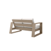 Rear View of Novara Cushion Deep Seating Patio Loveseat in Flax Finish with White Cushions