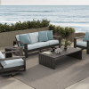 Novara Cushion Patio Sofa Set with Bari Coffee Table Overlooking the Ocean