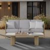 Orleans Woven Cushion Patio Sofa in Barley Finish with Gray Cushions Beside Coffee Table