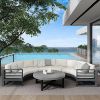 Curved Palermo modular seating arrangement with armrests.