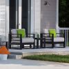 Modern Palermo cushion club chairs with green accent pillows on outdoor patio.