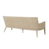 Back view of Siena wicker patio sofa in barley flax showing woven wicker design.