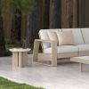 Forano Bellino 20″ Round Patio Side Table beside outdoor sectional sofa