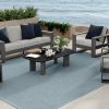 Outdoor Forano Aspen Coffee Table with onyx top and smoke base in patio lounge