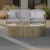 Hampton 56x26 oval outdoor coffee table with alabaster top styled with patio sofa set