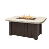 54" x 30" Trevi Pompano Fire Pit Table with chestnut base and shell stone top for luxury outdoor patios