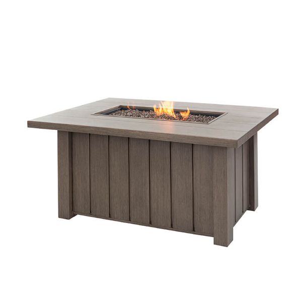 Trevi 50 x 32 Fire Pit Patio Table in Hickory finish with flames lit.