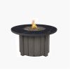 Round Trevi Aspen fire pit table with black onyx top and smoke base for luxury outdoor patios