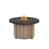 Trevi Pompano round fire pit table with slate top and flax base for resort poolside seating