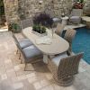 Pompano 84 x 40 Rectangular Patio Dining Table Set with Wicker Chairs beside Pool