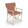 Boss folding sling dining chair with amber fabric sling and light polypropylene frame on white background