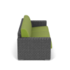 Side view of Highland Gray wicker outdoor patio sofa with bright green Dura-Flex Macaw cushions