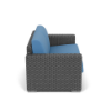 Side view of Highland Gray wicker outdoor patio love seat with blue cushions