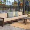 MGP Deep Seating cushioned modular sectional with right-arm seating arranged in a commercial poolside patio lounge area