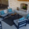 MGP Deep Seating armless lounge chairs arranged around a coffee table in an outdoor commercial patio setting