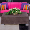 Java Chocolate square commercial wicker patio coffee table paired with colorful cushioned outdoor lounge seating