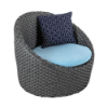 Highland Gray wicker cushioned commercial patio barrel chair with light blue seat cushion and patterned accent pillow