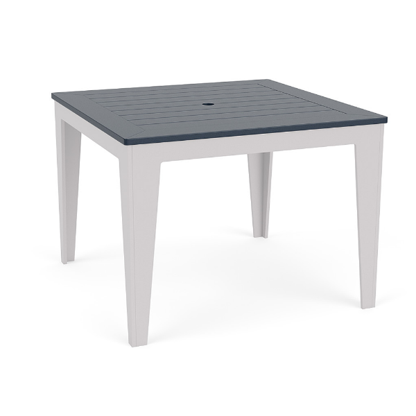 Angled view of 42-inch Leisure MGP square commercial patio dining table with Navy slatted top, White frame, and umbrella hole