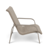 Side view of Horizon stackable commercial sling patio sand chair with Satin Amber aluminum frame and Cane Weaver Pacific sling