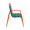Side view of Sundance vinyl strap commercial patio dining chair with Orange Burst aluminum frame and teal vinyl straps